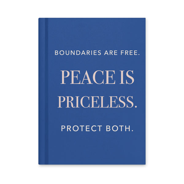 Royal-blue hardcover journal, front cover reading “Boundaries are free. Peace is priceless. Protect both.” in ivory and rosy-champagne serif lettering.