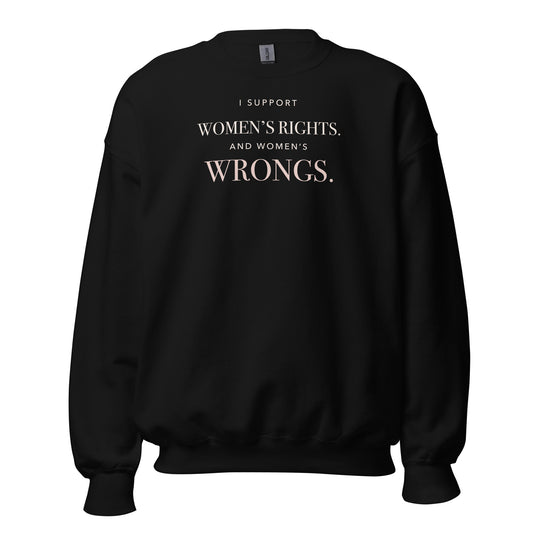 Black crewneck reading “I Support Women’s Rights. And Women’s Wrongs.” in warm-ivory and rosy-champagne typography.