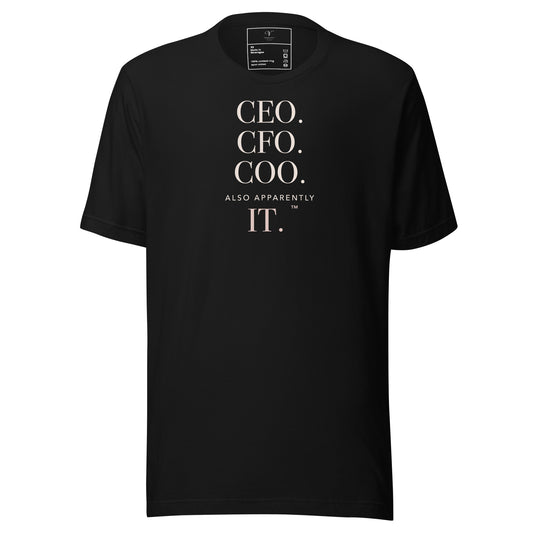 Black Voluptuocity™ tee reading “CEO. CFO. COO. Also Apparently IT.” in ivory and rosy-champagne editorial typography.