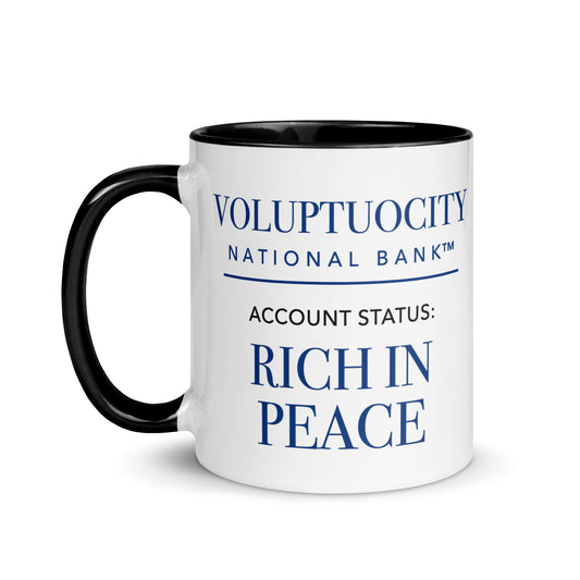 White 11 oz ceramic mug with black handle and interior, printed in deep royal blue: “Voluptuocity National Bank™ — Account Status: Rich in Peace.”
