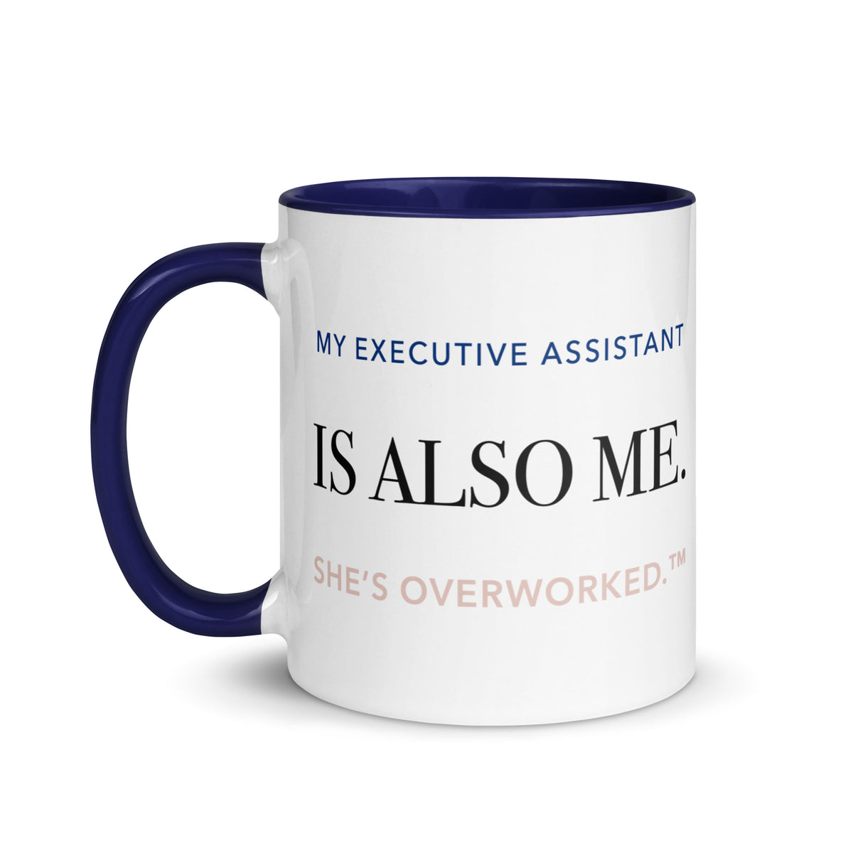 White ceramic mug with dark-blue details reading “My Executive Assistant Is Also Me. She’s Overworked.”