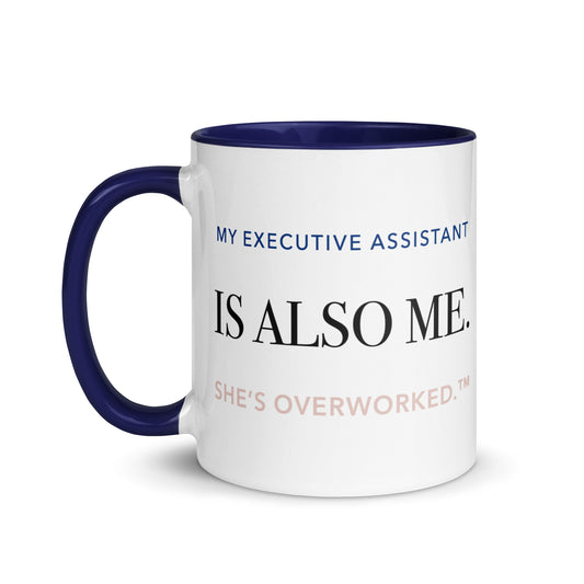 White ceramic mug with dark-blue details reading “My Executive Assistant Is Also Me. She’s Overworked.”